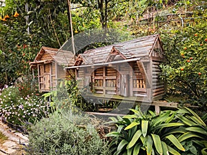 A log mini cottage shed in the middle of the flower garden in Cameron Highlands, Malaysia