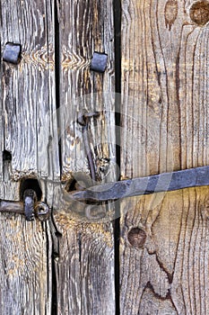 Log old house Doors, gates Forged rusty metal door handles, bolts, hinges, hooks