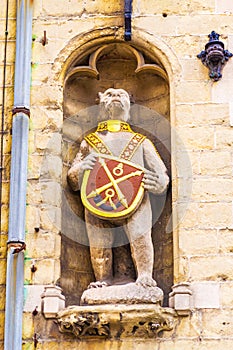 The Loge des Bourgeois house with picturesque animal sculpture Bruges Belgium photo