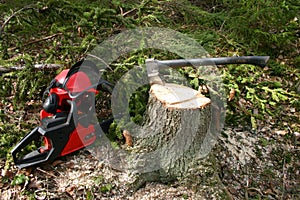 Logger equipment in forest photo