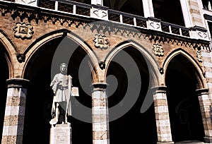 Giotto`s statue in the portico of the Loggia Amulea, Prato della Valle, Padova, Italy