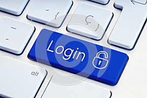 Login Word and lockpad on computer Keyboard Key. Technology security or hacking concept