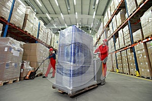 Logistic - workers in storehouse