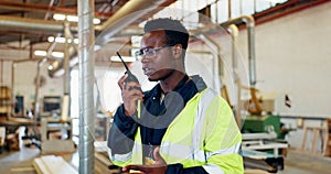 Logistics, black man and radio in warehouse for communication, delivery or distribution. Carpentry, inspection and male
