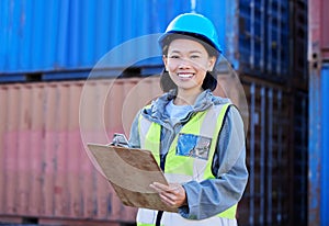 Logistics, cargo and a woman with inventory checklist on clipboard. Container yard, supply chain and happy shipping port