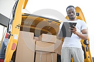 Logistics, delivery car and man with clipboard paperwork or checklist for stock, product distribution or shipping info