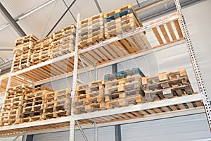 Logistics hangar warehouse with lots shelves racks with pallets