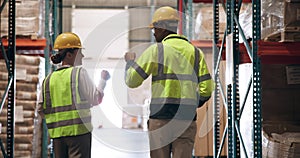 Logistics, supply chain and fist bump with warehouse team walking together to check stock for inspection. Delivery