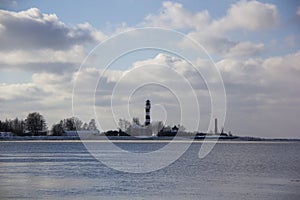 Logistics and transportation Cargo ship with ports crane bridge coming in port