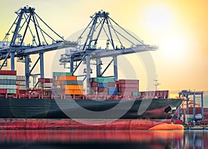 Logistics and transportation of International Container Cargo ship in a harbor at sunset time, logistic import export background