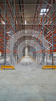 logistics warehouse with empty high racks