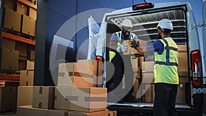 Logistics Warehouse Two Happy Diverse Workers Talk, Joke while Loading Delivery Truck with Cardboard
