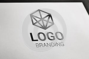 Logo branding concept on white paper. Profesional logo design company presentation photo