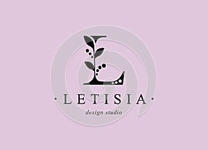 Logo, capital letter l. Monogram of Botanical Minimalistic with natural plant.