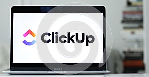 Logo of ClickUp, a productivity and product management software, displayed on a laptop screen