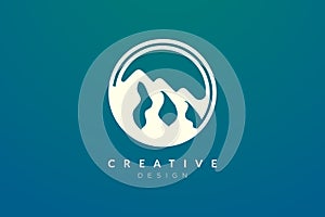 Logo design that combines circle objects with mountains.
