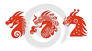 Logo design. Heads of dragons on white.