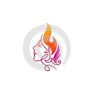 The logo of the face of a beautiful woman with her hair loose like a burning fire