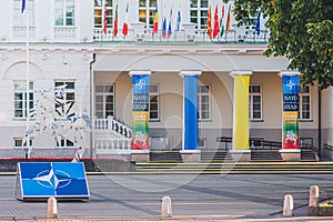 Logo and flags of NATO members near the President palace waving together with flag of Ukraine during Nato summit 2023