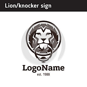 Logo knocker in the form of a lion`s head photo