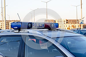 The logo of municipal police on police car