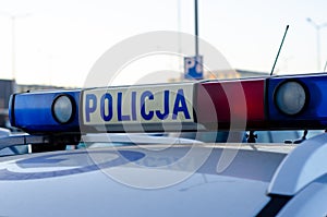The logo of municipal police on police car