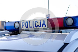 The logo of municipal police on police car