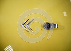 Logo of old mythic french vintage car with yellow sheet metal