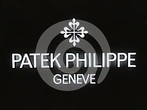 The logo of Patek philippe geneve brand with black background.
