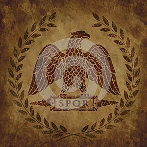 Logo of the Roman eagle on an old shabby texture.