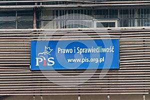 Logo and sign of PiS, Law and Justice Polish: Prawo i Sprawiedliwosc at office of political party at Nowogrodzka street
