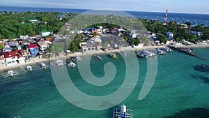 Logon Beach and Boats in Malapascua Island Seashore in Cebu, Philippines. Sulu Sea, Boats and Beautiful Seascape in Background I