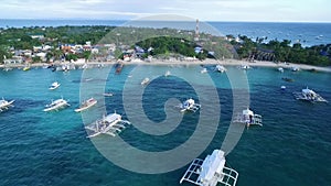 Logon Beach and Boats in Malapascua Island Seashore in Cebu, Philippines. Sulu Sea, Boats and Beautiful Seascape in Background VII