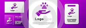 Logotype Hands with animals footprint icon isolated on white background. Pet paw in heart. Love to the animals. Logo