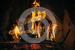 Logs Burning Inside Fireplace
