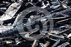 Logs from a burnt house, place after a fire