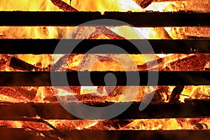 Logs in fire. Big huge traditional fire blaze glow. Background