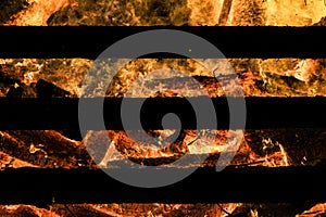 Logs in fire. Big huge traditional fire blaze glow. Background