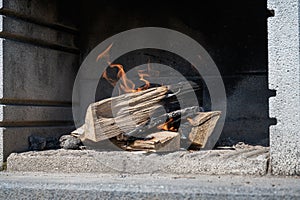 Logs in outside fire grill