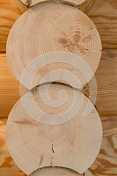 Logs in the wall of the house