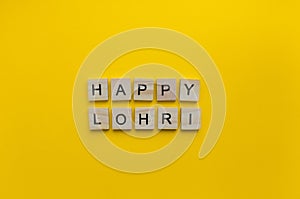 Lohri, minimalistic banner with the inscription in wooden letters