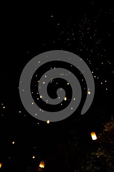 Loi Krathong and Yi Peng released paper lanterns on the sky during night