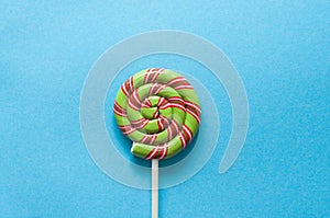 Lollipop on blue background