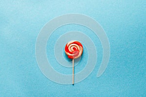 Lollipop on blue background