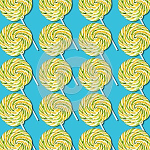 Lollipop candies arrangement on turquoise background