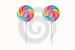 Lollipop, Colorful rainbow lollipop swirl on plastic stick isolated on white background.