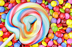 Lollipop and multicolored smarties