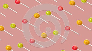 Lollipop pattern. Mix of multicolored candies on a modern background