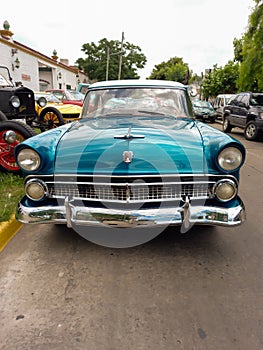 old Ford Customline V8 tudor sedan 1955-1956. Front view. Grille. CADEAA 2021 classic cars Copyspace