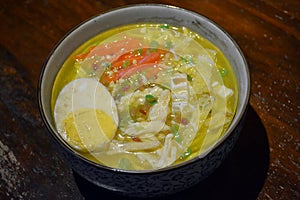 Lomi noodles with hot soup and egg food display